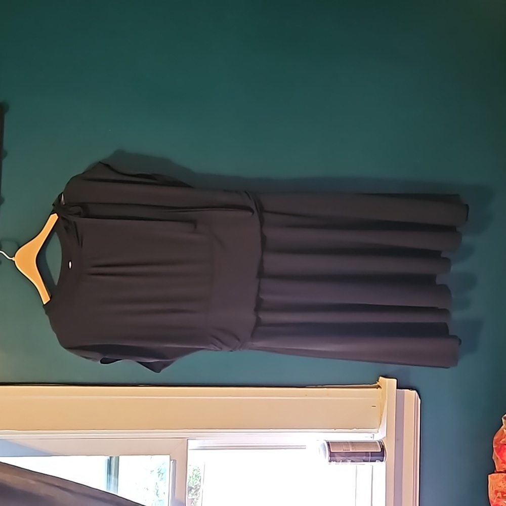 Modcloth, black dress with cap sleeves and neck tie accent to the side. Pockets!